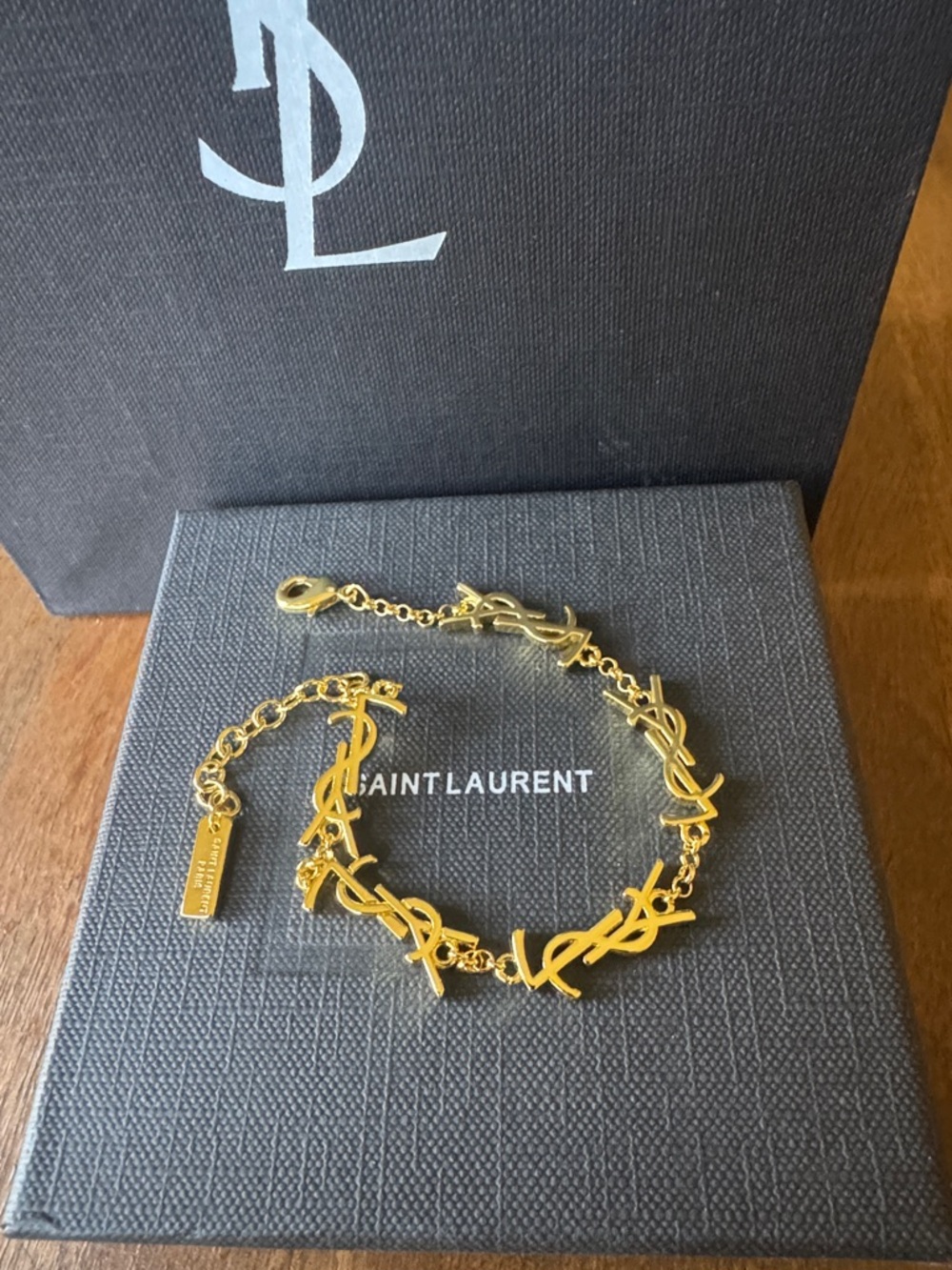 Saint Laurent Gold-Tone YSL Link Bracelet - Picture 6 of 9